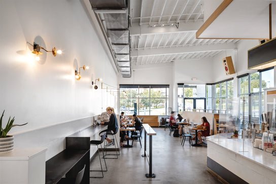 Interior of Merit Coffee shop, showcasing a welcoming atmosphere